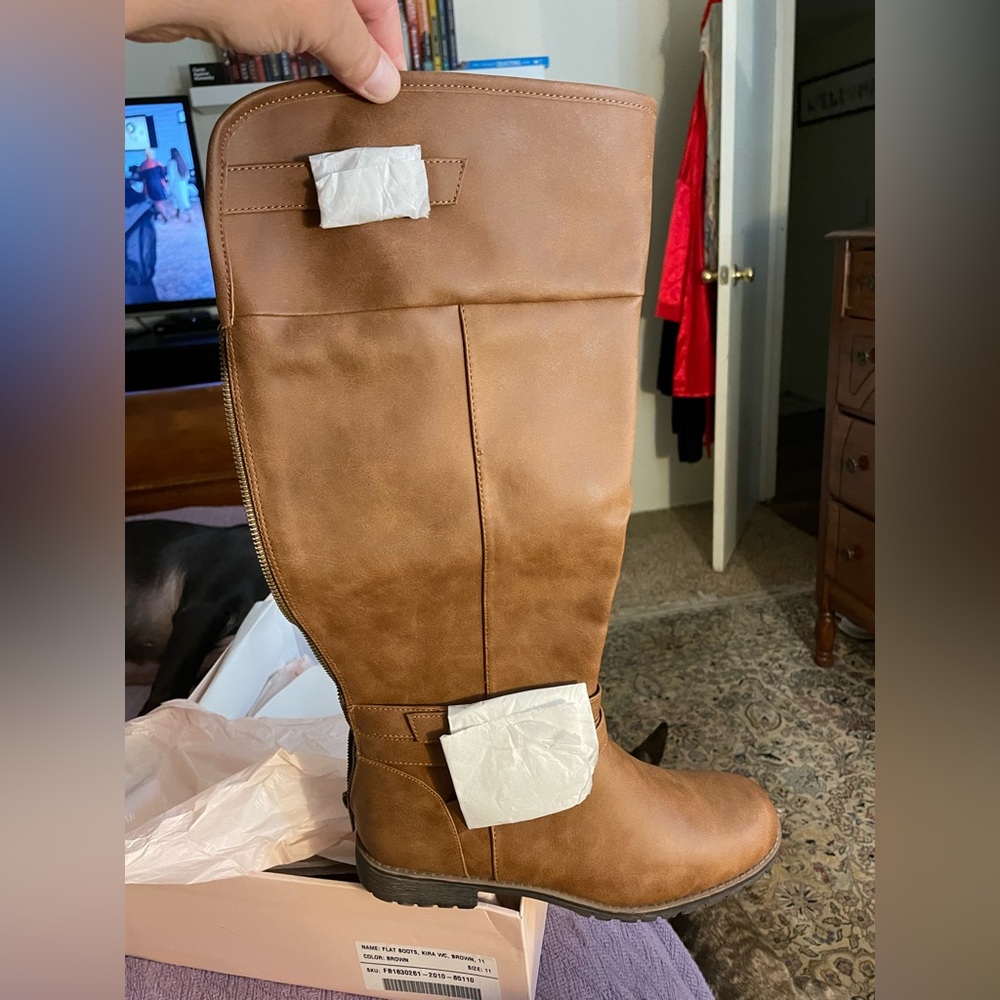 Flat boots. Camel color.  Size 11. Never worn
